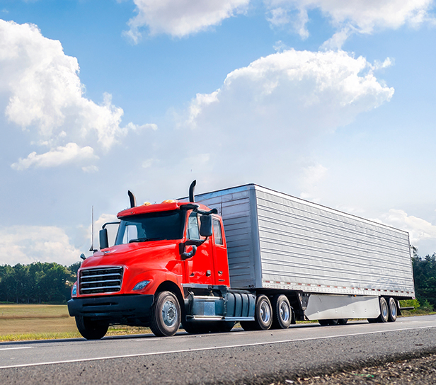An 18-wheeler moving on a Houston freeway